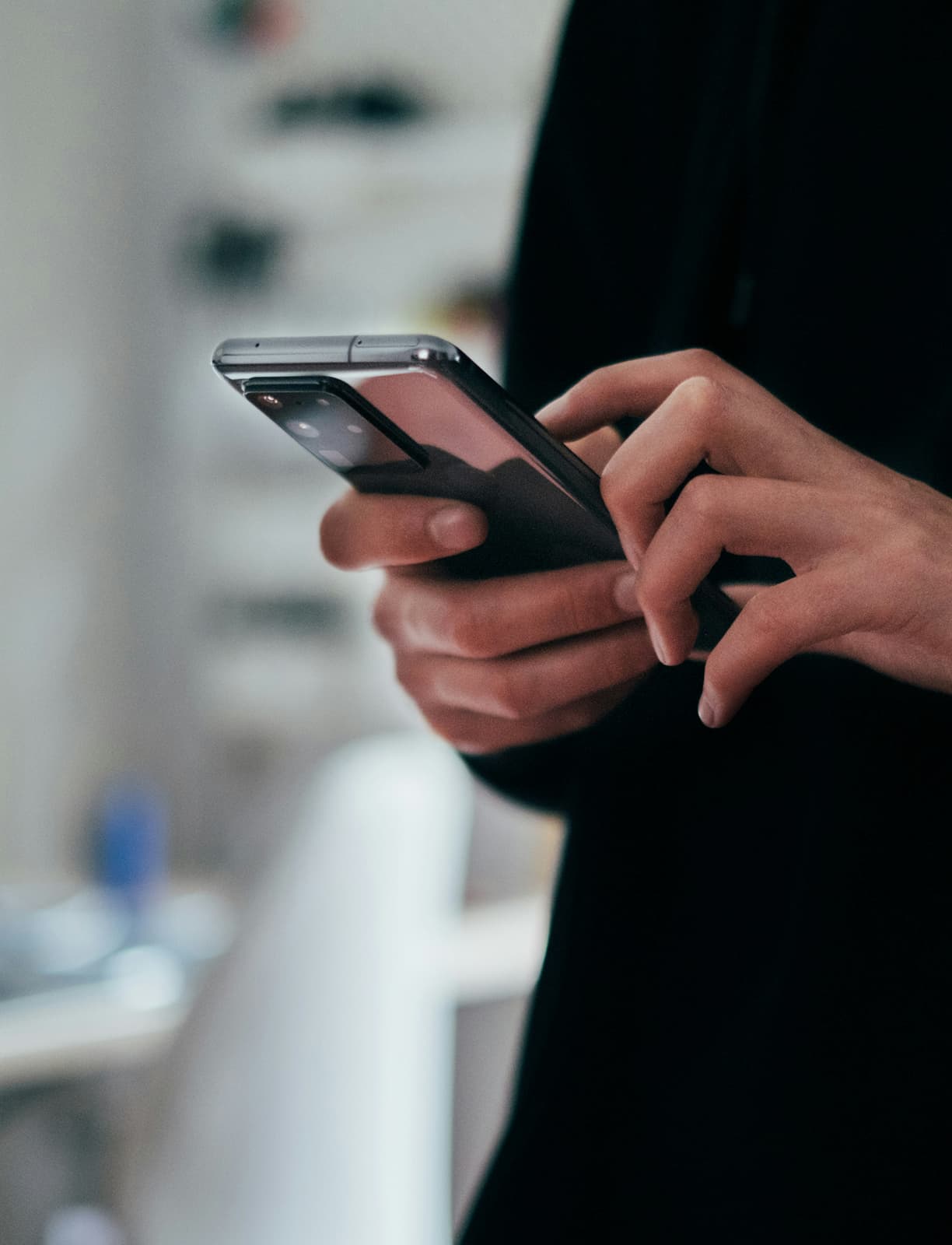 Man holding a smartphone showcasing latest mobile device
