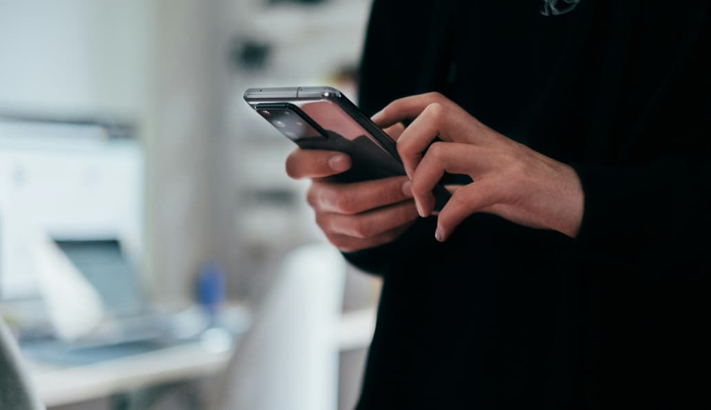 Man holding a smartphone showcasing latest mobile device