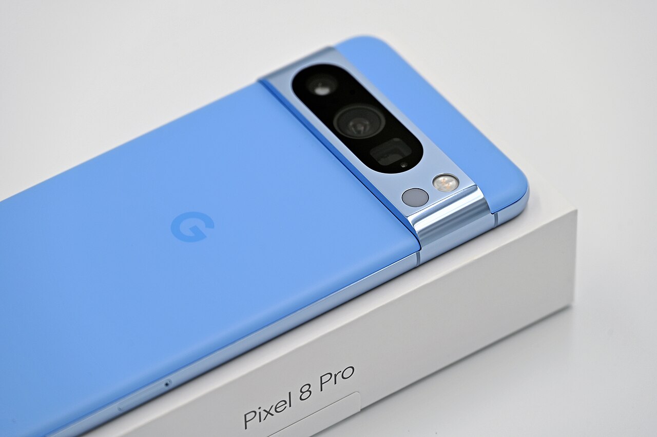 Blue Google Pixel 8 Pro resting on its box, sold for cash near Raleigh, NC
