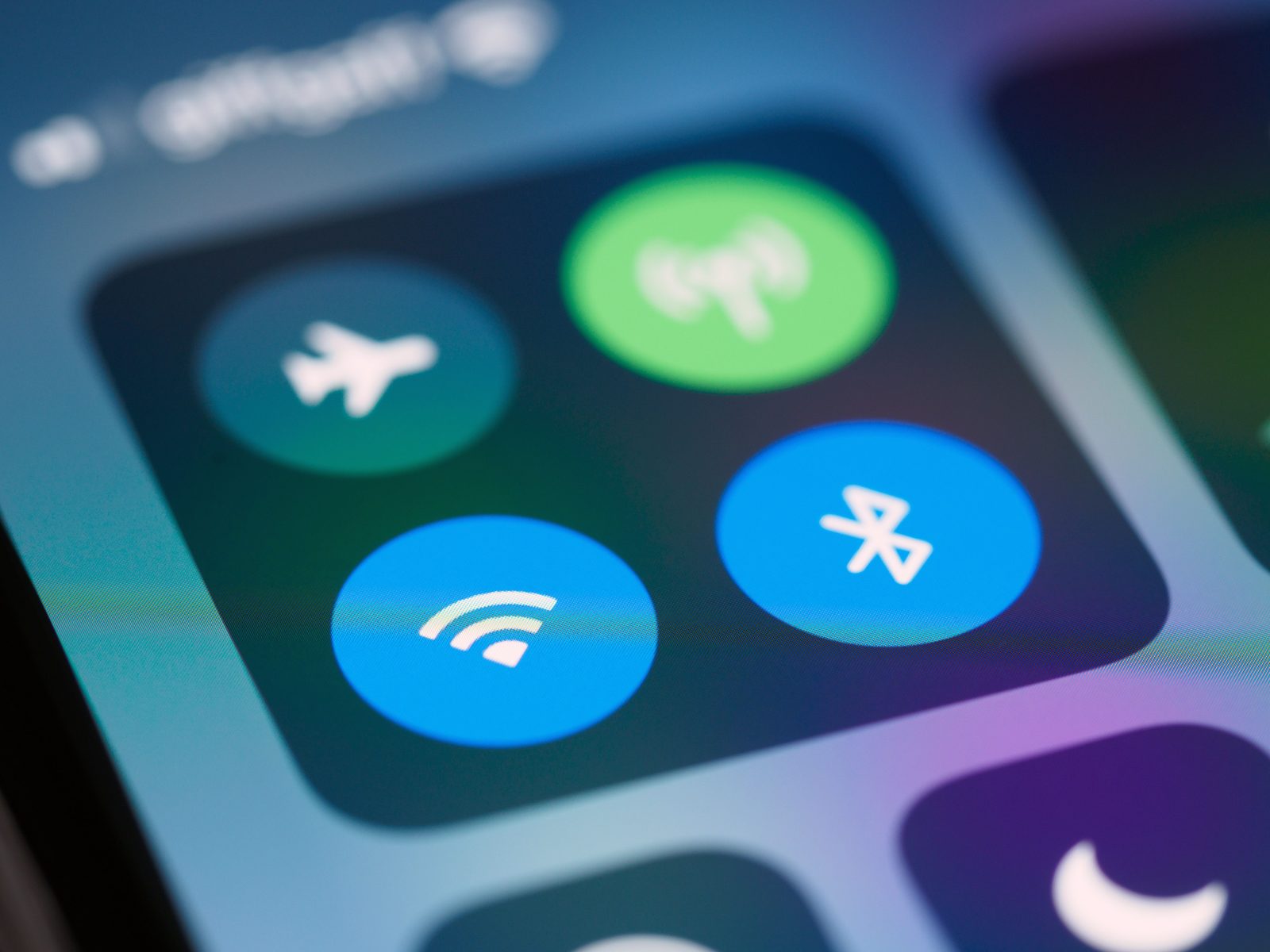 Close-up of an iPhone Control Center showing the airplane mode, cellular, Wi-Fi, and Bluetooth toggles