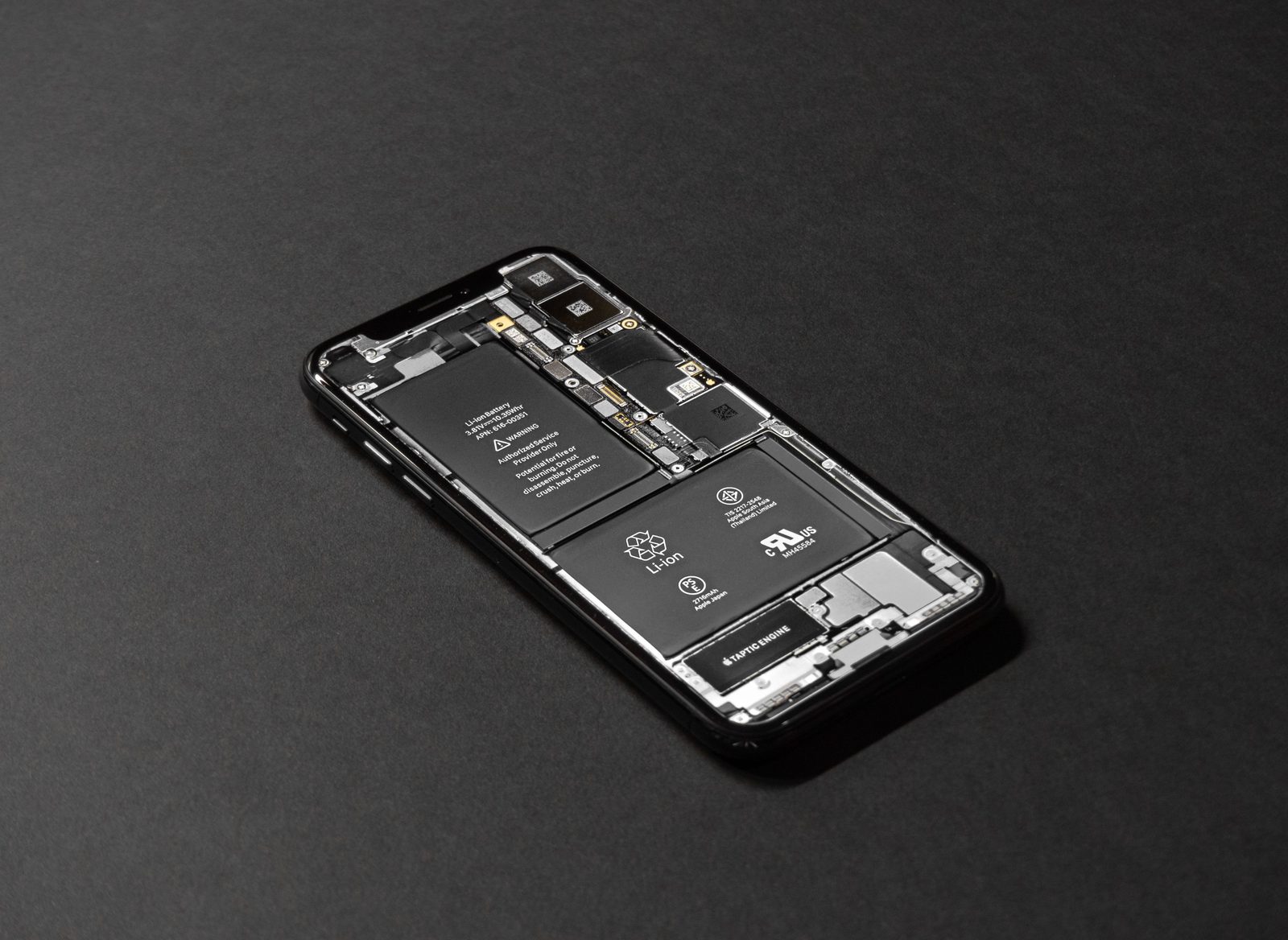Inside view of an iPhone showing its lithium-ion battery and internal components